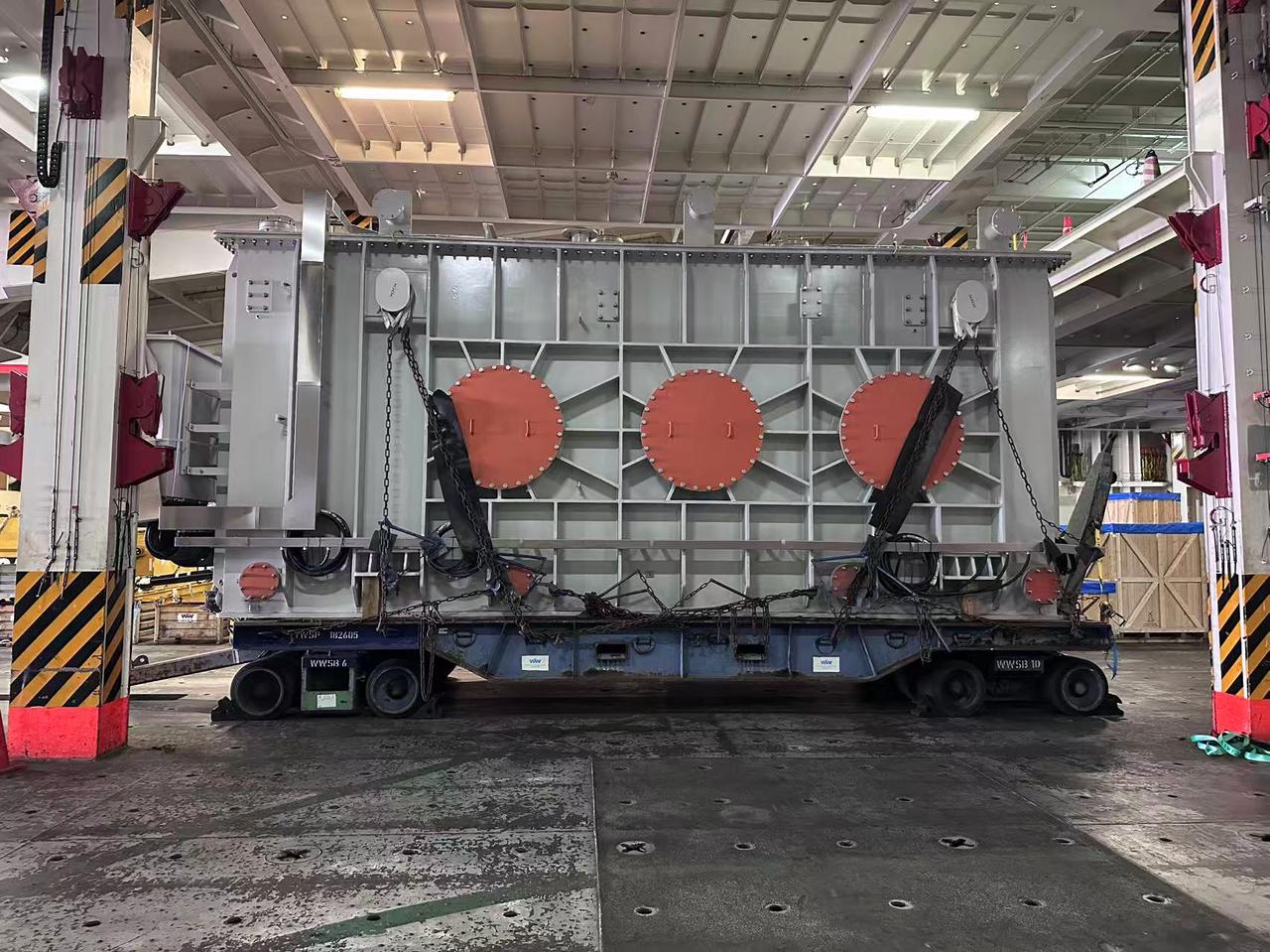 chint 165-ton transformer secured on mafi trailer inside roro vessel