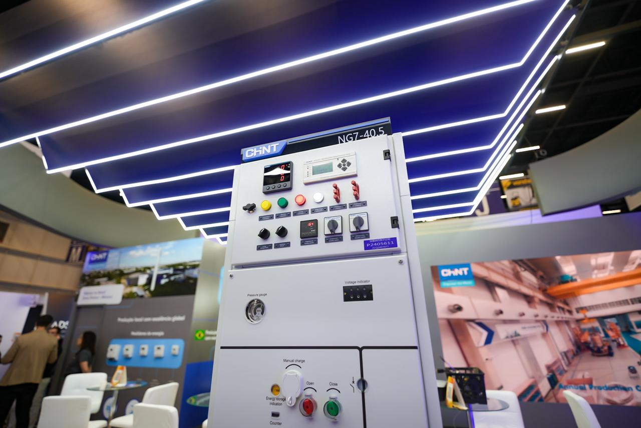 CHNT NG7-40.5 industrial switchgear control panel with digital display and control buttons showcased at an electrical exhibition